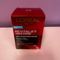 L’Oréal Paris Revitalift Triple Power Anti‑Aging Moisturizer (Fragrance‑Free, 1.7 oz / 48 g)