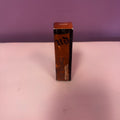 Urban Decay Lip Bond Glossy Lip Color in Pleased (0.2 fl oz / 6 mL).