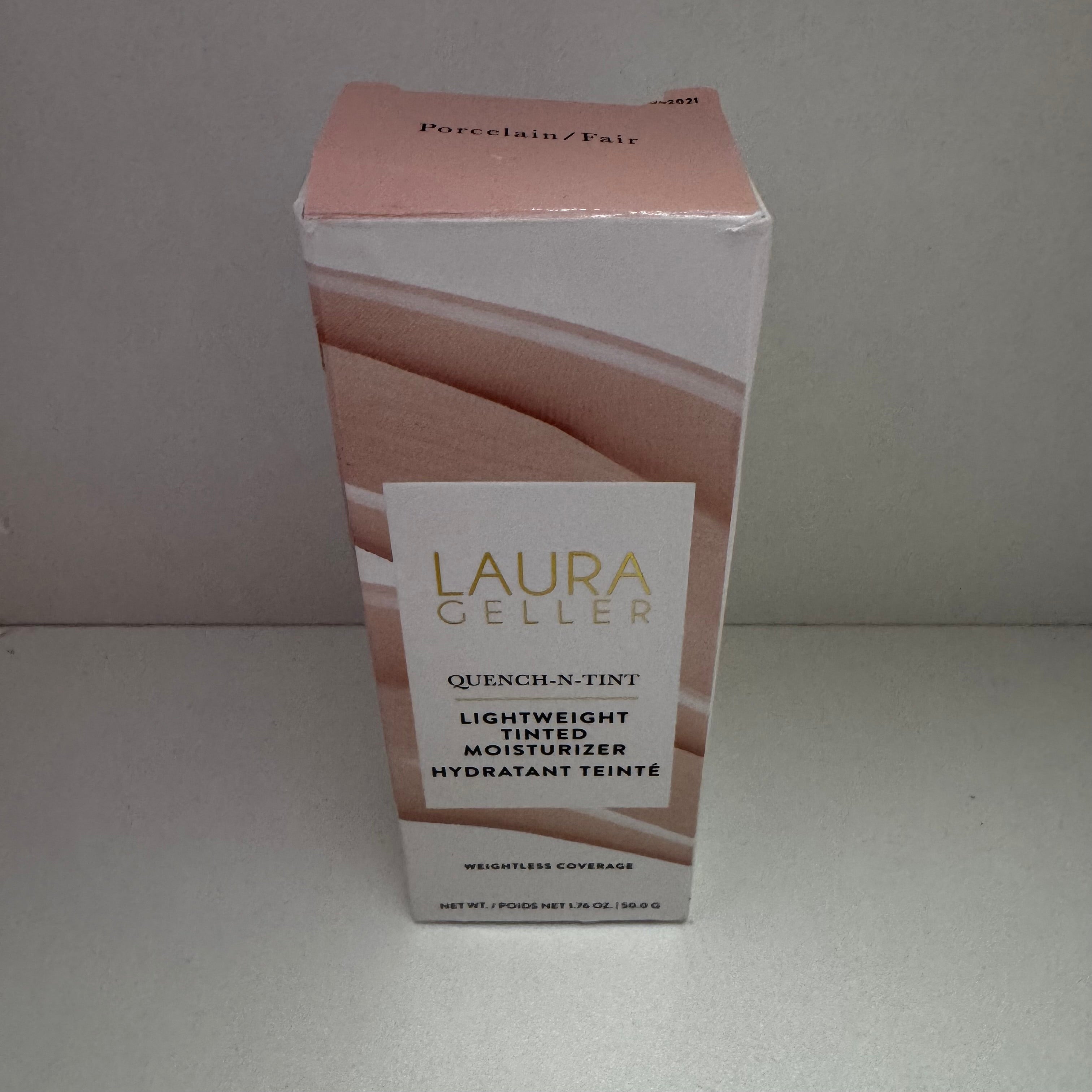 Laura Geller – Quench‑N‑Tint Lightweight Tinted Moisturizer (Porcelain / Fair)