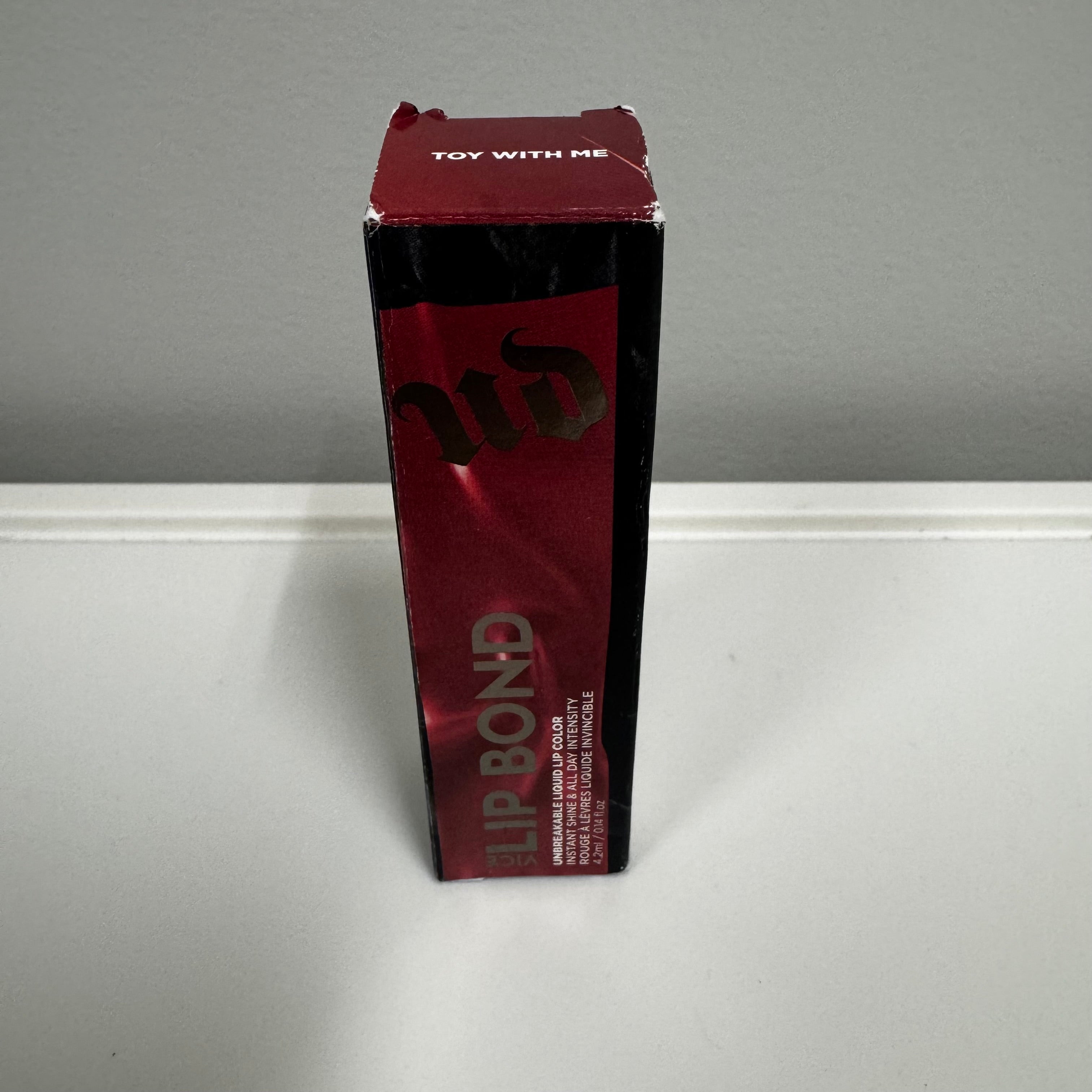 Urban Decay – Lip Bond Unbreakable Liquid Lip Color (Shade Toy With Me, 0.2 fl oz)